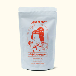 Front view of Woon Genmaicha tea pouch with white packaging featuring red illustrated woman in Japanese style and product details