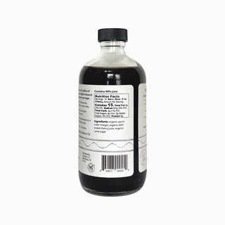 Side view of MOTHER shrub Black Cherry bottle displaying nutrition facts panel with 40% juice content on white background