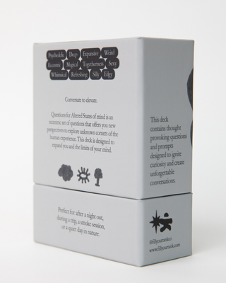 Side view of card deck box showing descriptive words like Psychedelic, Deep, Expansive, Weird, Magical, Togetherness, Sexy in speech bubbles and product description text