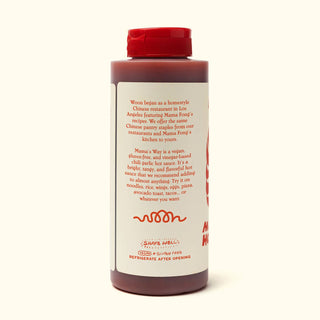Back label of Woon Mama's Way Hot Sauce bottle describing vegan gluten-free chili garlic sauce and usage suggestions