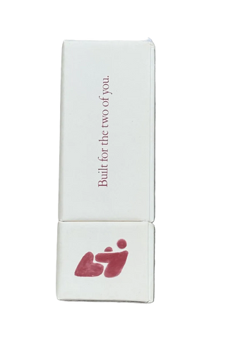 Side view of white card deck box showing Built for the two of you text vertically and red illustration of two figures