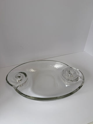 Full view of vintage clear glass centerpiece with two spiral candle holders on opposite ends of oval dish
