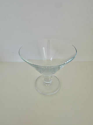 Overhead angled view of vintage martini glass displaying interior bowl depth and horizontal ribbing detail