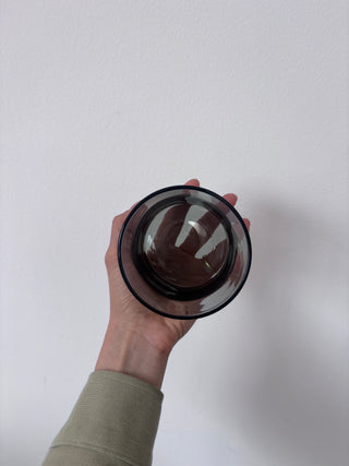 Top-down view of vintage smoked glass tumbler showing circular opening and black rim detail
