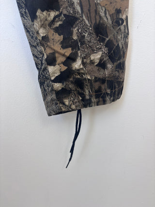 Close-up detail of adjustable drawstring ankle tie on vintage camo cargo pants